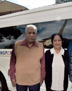 The Theagarajahs with their travel trainer and Easylink bus.