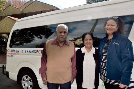 The Theagarajahs with their travel trainer and Easylink bus.